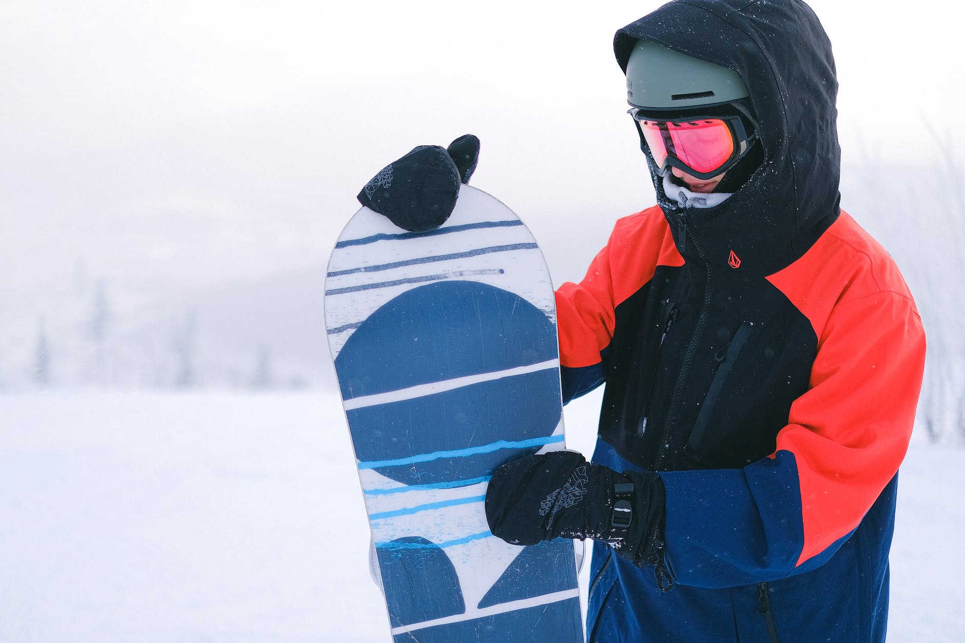 a person holding a snowboard